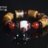 Brown Dzi Bead with Red Bead Ornaments