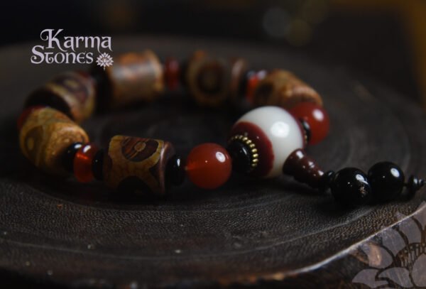 Brown Dzi Bead with Red Bead Ornaments