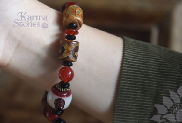 Brown Dzi Bead with Red Bead Ornaments