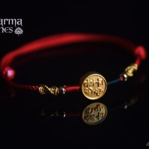 Red Tibetan-Style Braided Bracelet with a Golden "Peace and Joy" Charm